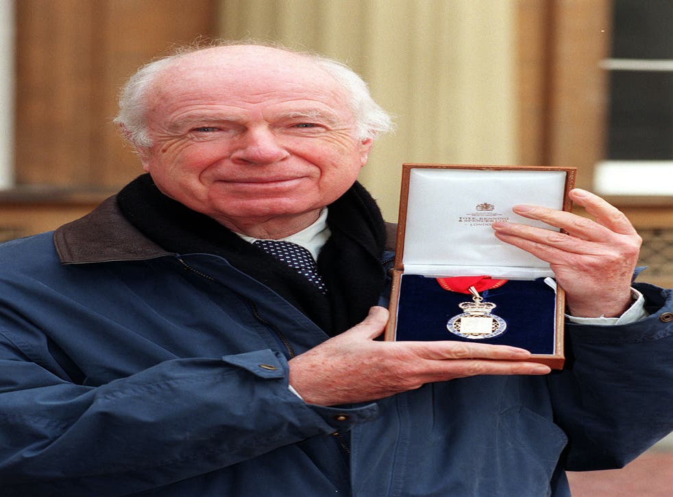 Peter Brook outside Buckingham Palace after receiving the Insignia of a member of the Order of the Companions of Honour from the Queen (PA)