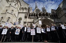 Criminal courts face disruption as barristers strike for second week