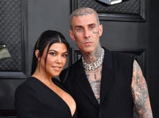 Kourtney Kardashian and Travis Barker seen flying commercial after family was criticised for private jet use
