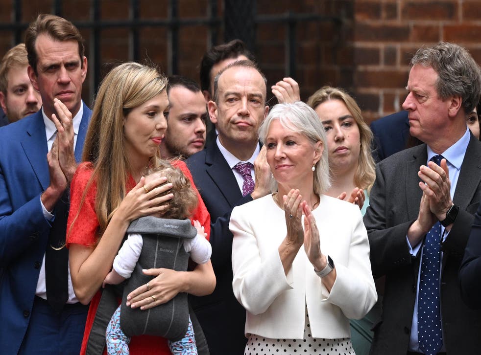 <p>Boris Johnson’s wife, Carrie, and cabinet minister Nadine Dorries outside No 10 </p>