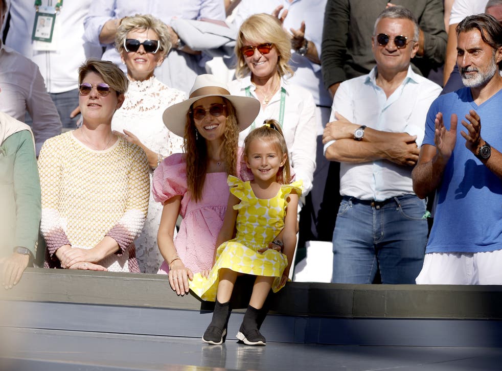 Jelena Dokovic and Tara Dokovic react following Novak Djokovic’s victory (PA)
