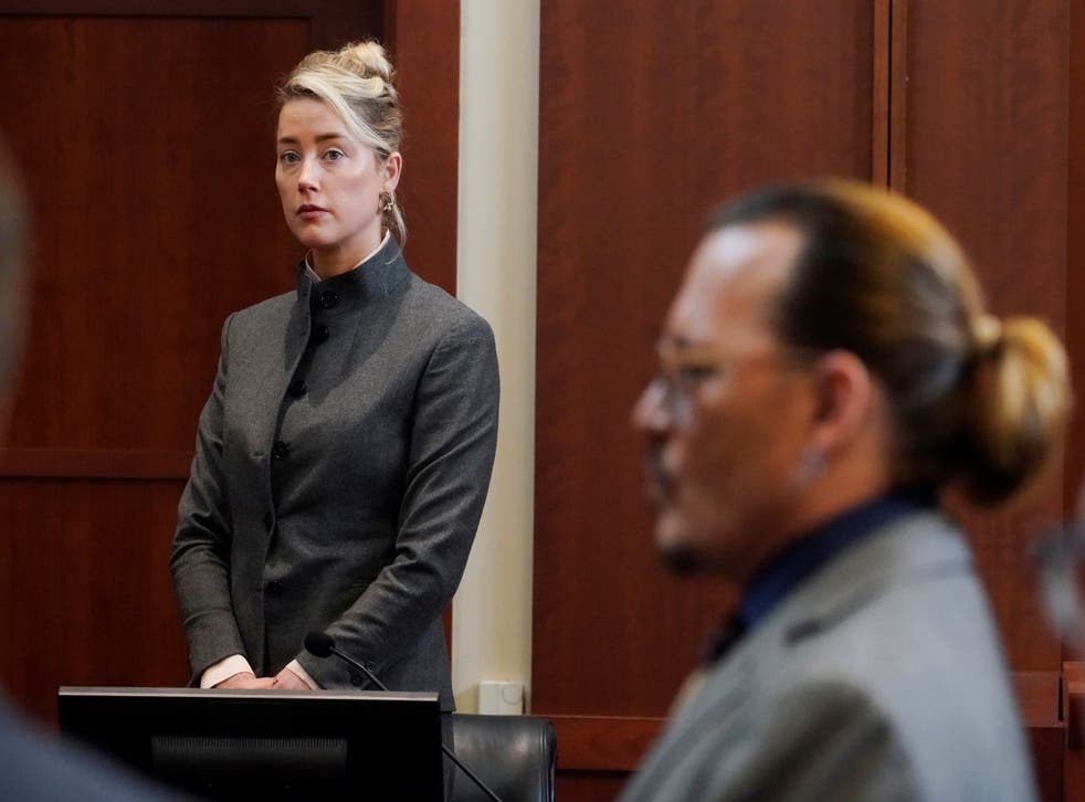 <p>Amber Heard and Johnny Depp pictured during their defamation case </p>
