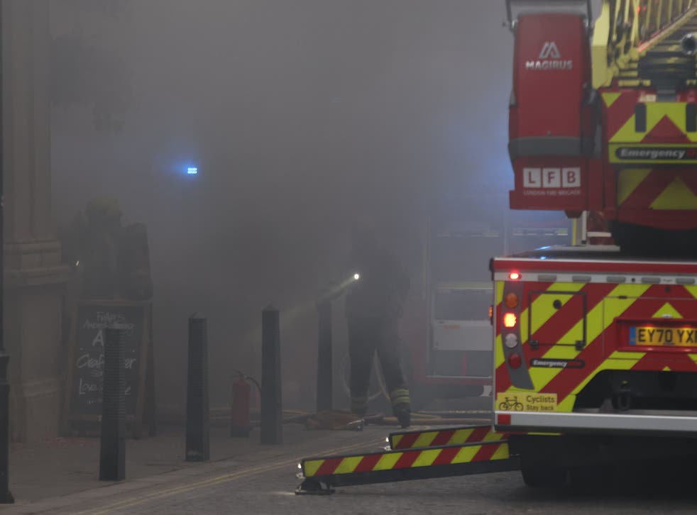 <p>Thick smoke cloaks the street outside Admiral pub</bl>