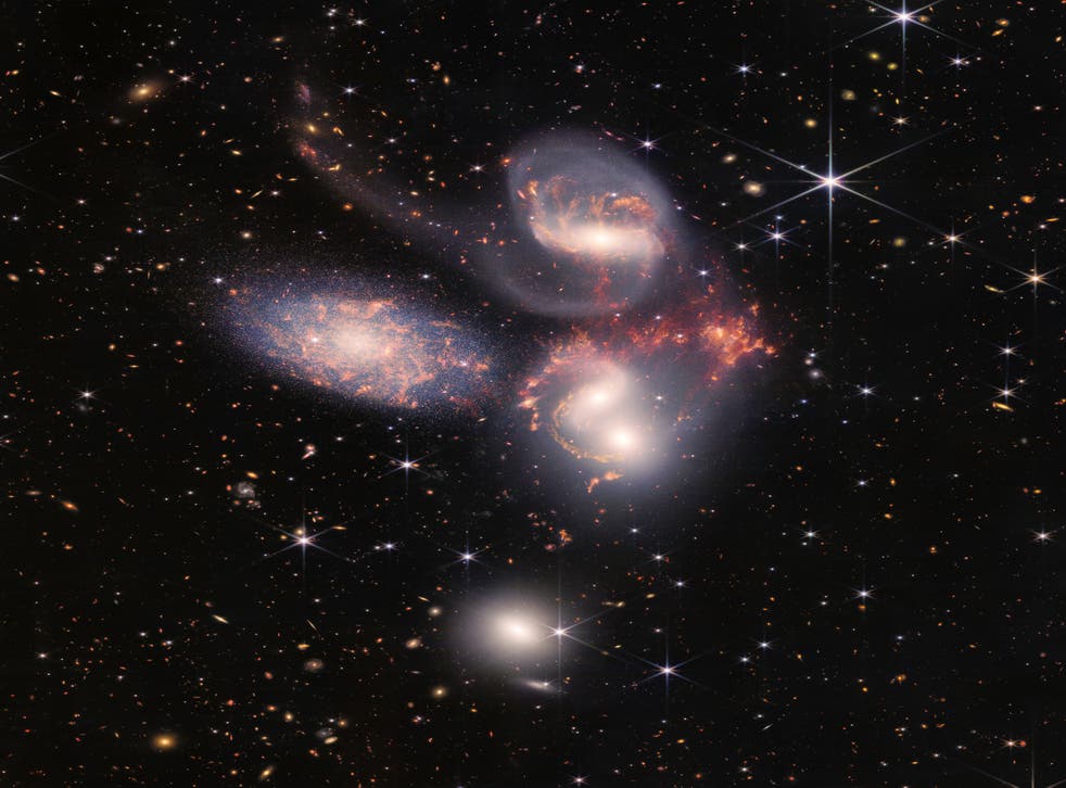 <p>Stefan’s Quintet, a visual collection of five distant galaxies, was one of the Webb Telescope’s first full-colour images</p>