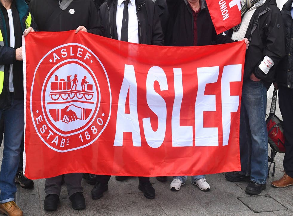 <p>An Aslef flag on a picket line at a previous strike by the train driver members </bl>