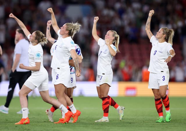 Ellen White, Millie Bright, Beth Mead and Rachel Daly celebrate with the fans after England beat Northern Ireland in their last Euro 2022 group match in Southampton