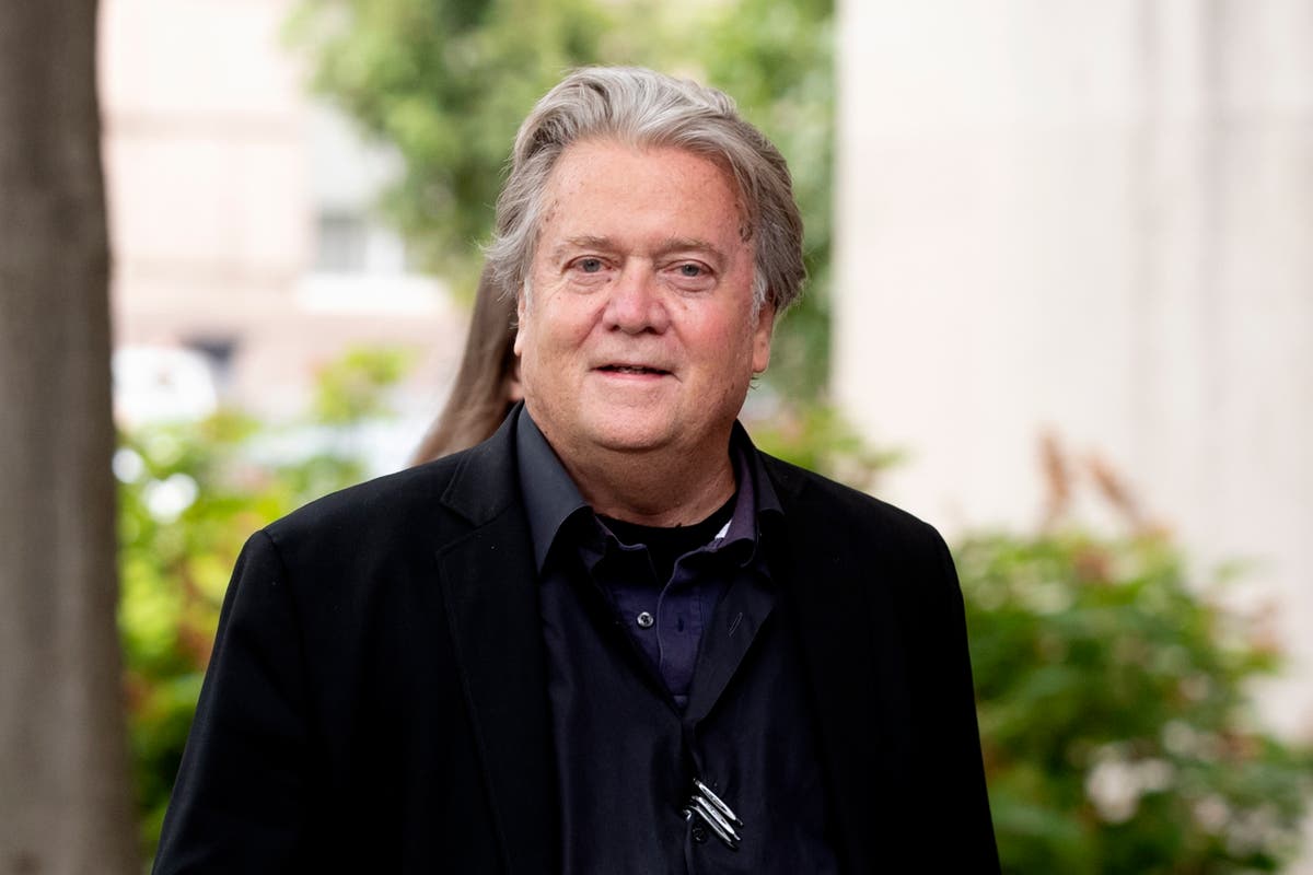 Steve Bannon accused of treating trial as theatre arriving for court in three shirts