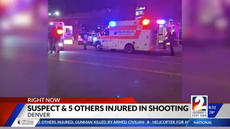 Five bystanders shot when Denver police open fire on man holding gun in crowded street
