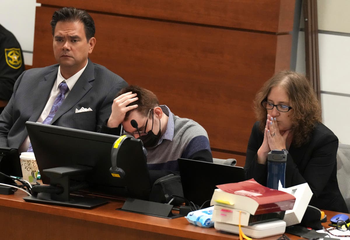 Nikolas Cruz hides face as videos of Parkland massacre shown at death penalty hearing
