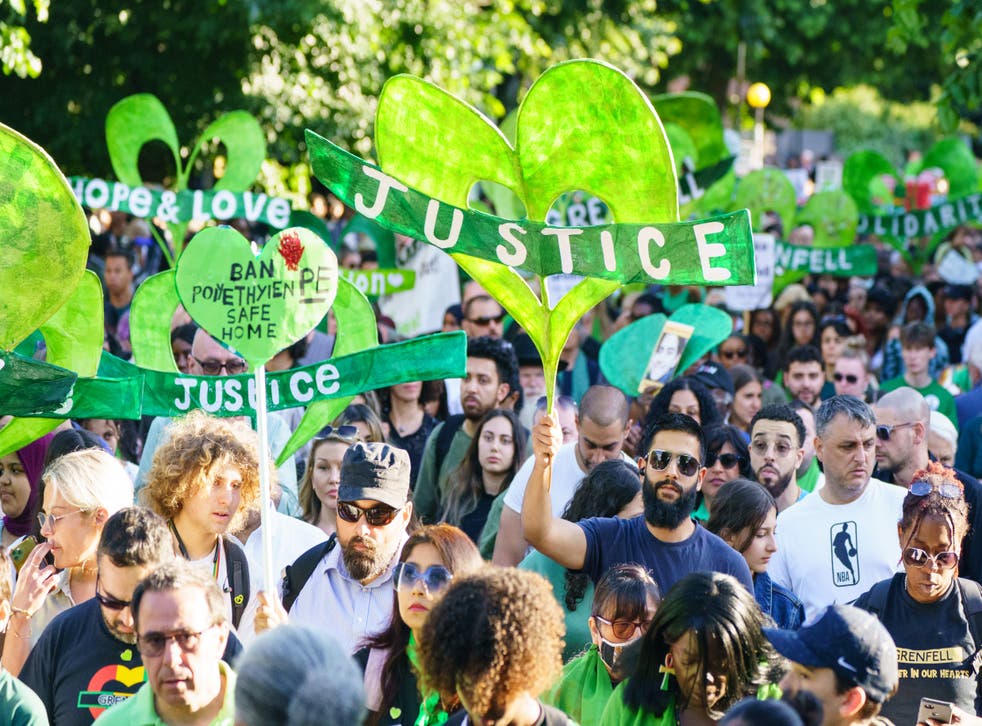 Thousands of people took part in a silent walk near Grenfell Tower in North Kensington, 西ロンドン, to mark the five-year anniversary (Dominic Lipsinki/PA)