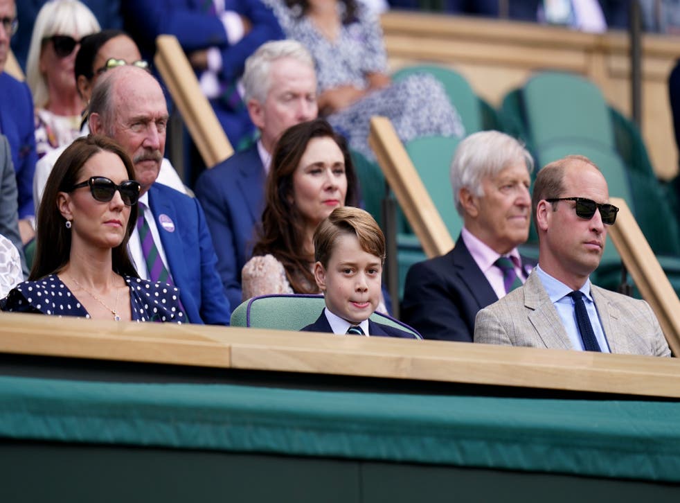 The Duke and Duchess of Cambridge with Prince George in the Royal Box at Wimbledon during the men’s final (Adam Davy/AP)