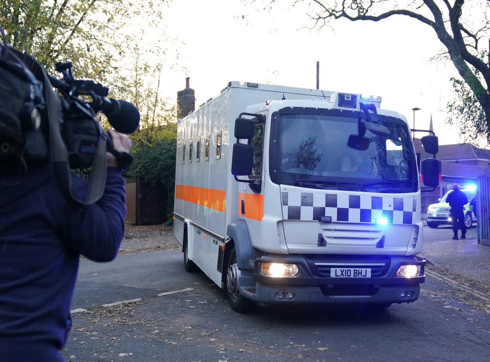 A police van carrying the three convicted burglars was escorted by a police helicopter (Yui Mok/PA)