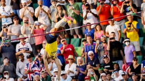 Sweden's Armand Duplantis clears the bar to set a new world record of 6.21m and win gold in the final of the men's pole vault at the World Athletics Championships in Oregon