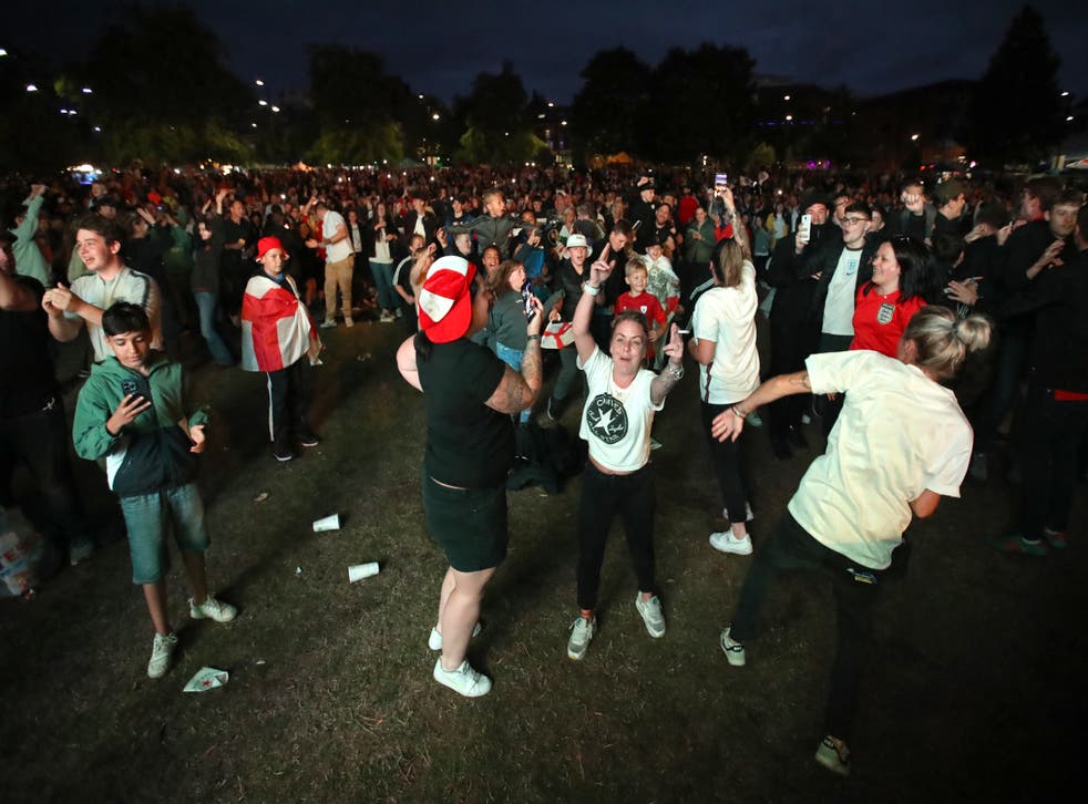 England fans celebrate at Devonshire Green (Isaac Parkin/PA)