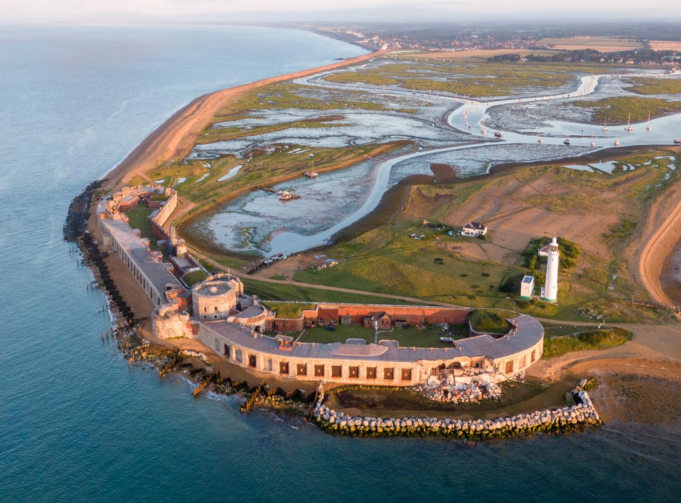<p>An aerial view showing the damage at Hurst Castle in 2021 in Hampshire near Lymington, England. Preservationists cite the damage as a consequence of intensifying storms and sea-level rise driven by climate change </p>