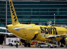 Spirit Airlines employee suspended after he was filmed punching a female customer