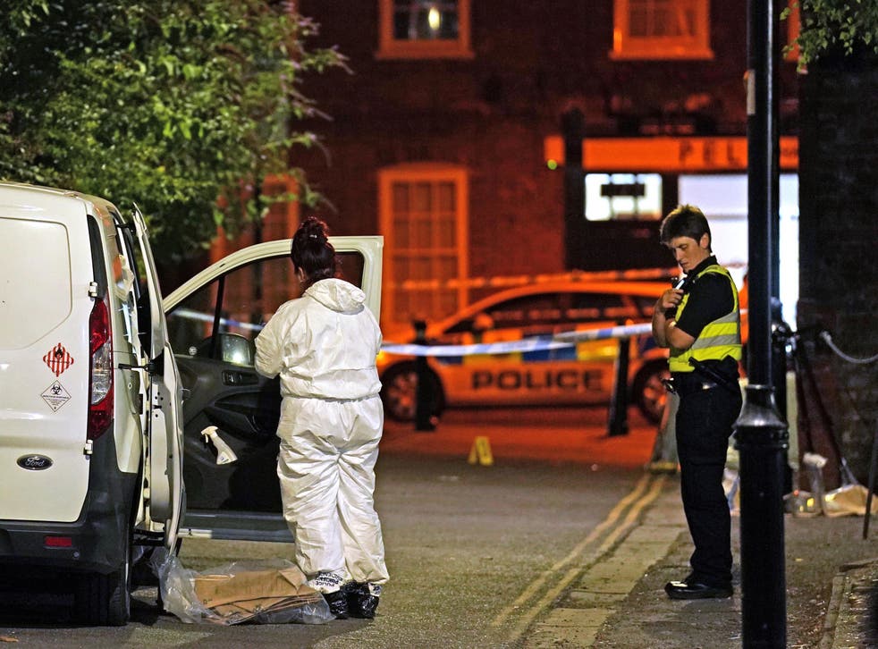 <p>Police at the scene in Boston after a nine-year-old girl died from a suspected stab wound</s>