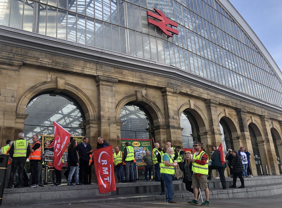 The picket line outside Liverpool Lime Street station (Eleanor Barlow/PA)