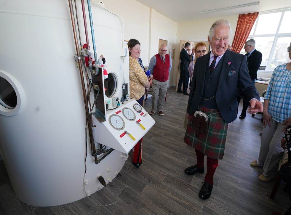 The Prince of Wales, known as the Duke of Rothesay when in Scotland, is shown the centre’s barochamber (Andrew Milligan/PA)