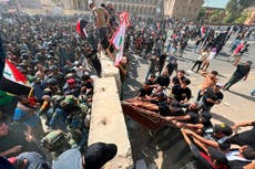 Iraqi security forces clash with followers of cleric