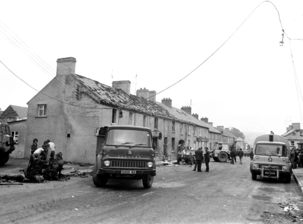 The clean-up in the Co Londonderry village of Claudy on July 31, 1972 (PA)