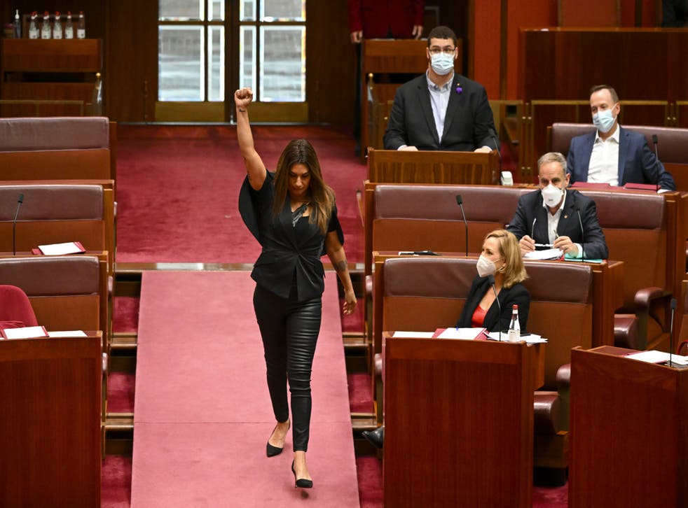 <p>Lidia Thorpe also raised her fist while walking up to the centre of the parliament for the oath </bl>