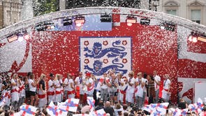 England's players celebrate during a victory party in Trafalgar Square in central London