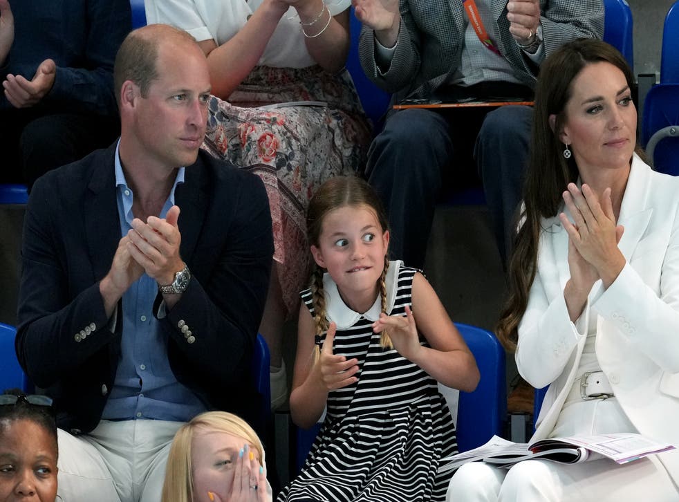 Princess Charlotte takes in the atmosphere at the swimming (Jacob King/PA)