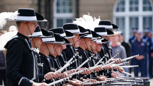 The Top Secret Drum Corps from Switzerland during the working rehearsal for this year's Royal Edinburgh Military Tattoo, entitled Voices, at Redford Barracks, Edingburgh
