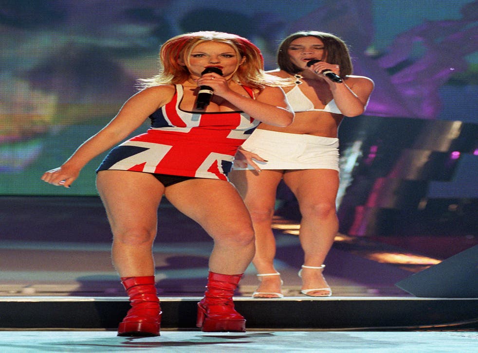 Geri Halliwell aka Ginger Spice performing at the Brit Awards 1997 (Fiona Hanson/PA)