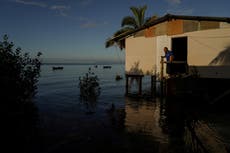 Flooded Pacific Ocean communities want polluters to pay for relocation from ancestral lands