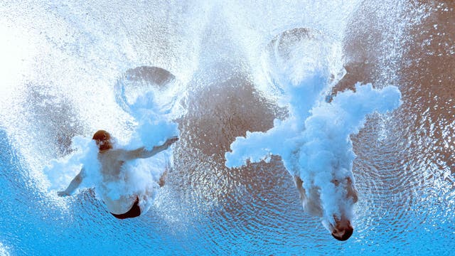 England's Anthony Harding and England's Jack Laugher competes to win and take the gold medal in the men's synchronised 3m springboard diving final on day eight of the Commonwealth Games at Sandwell Aquatics Centre in Birmingham, central England