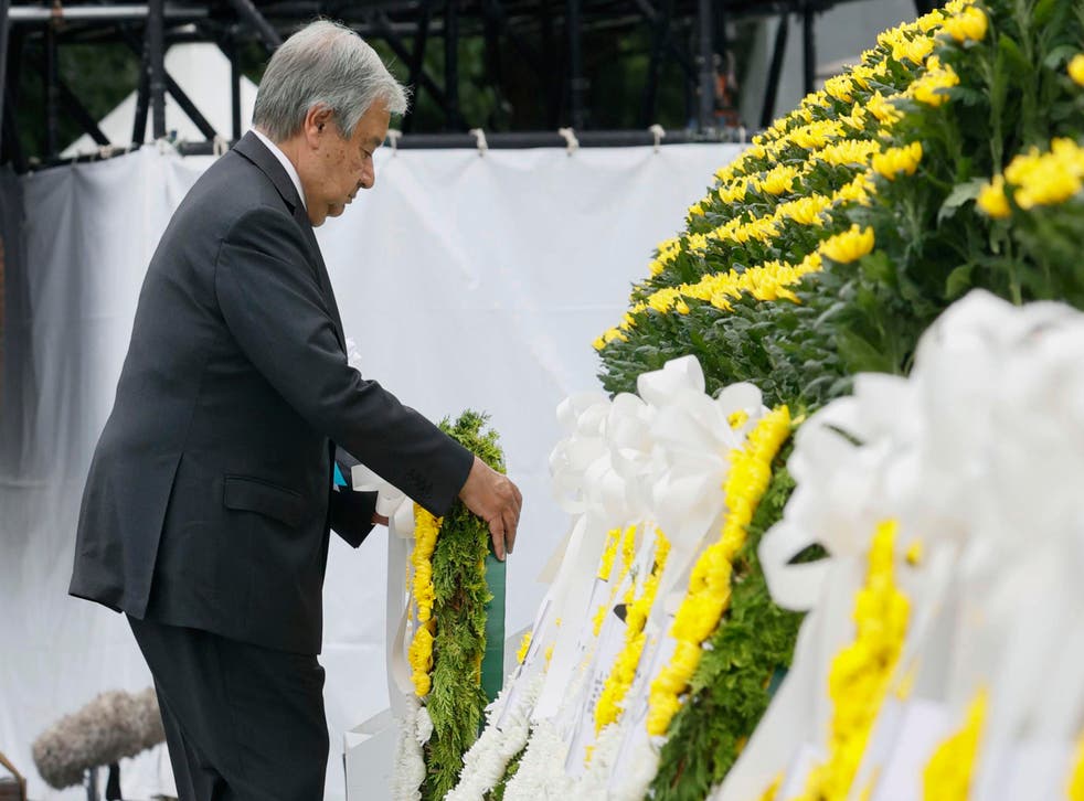 <p>UN Secretary General Antonio Guterres lays a wreath at the cenotaph for the atomic bombing victims at the Hiroshima Peace Memorial Park during the ceremony marking the 77th anniversary of the atomic bombing in the city</p>