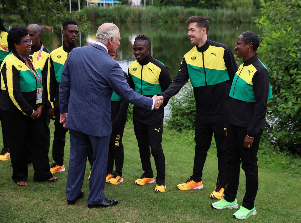 The Prince of Wales meets members of the Jamaican team during a visit to the Commonwealth Games (Phil Noble/PA)