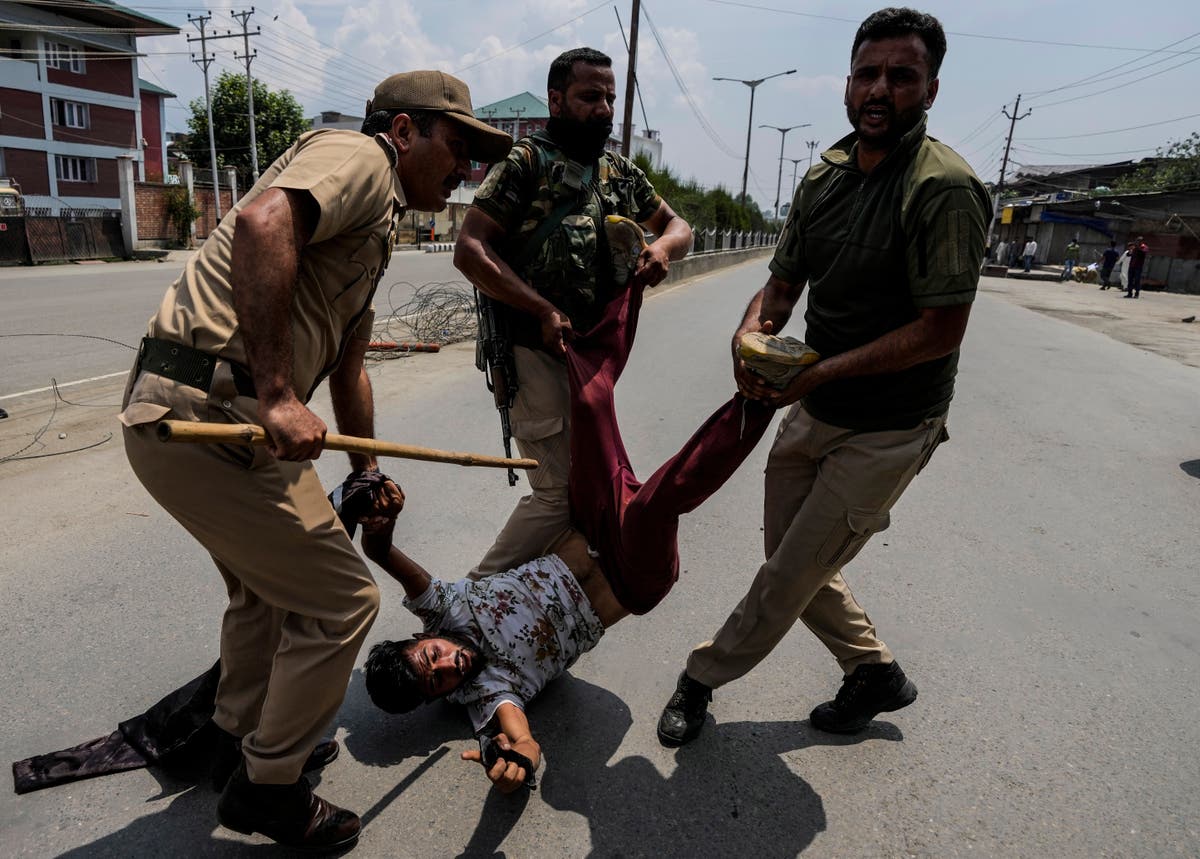 Police break up Muslim gathering in Kashmir, dozens detained