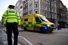 Armed police sent to heart attack patients as crisis-hit NHS buckles under surging demand