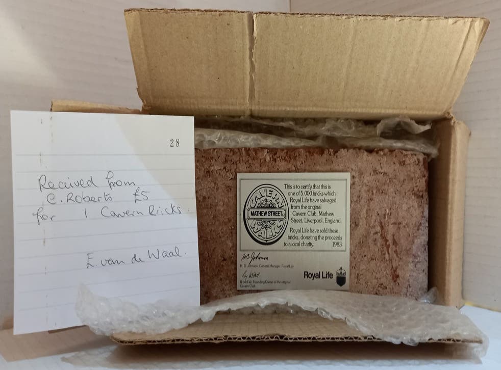 A Cavern Club brick bought for £5 is estimated to fetch up to £600 at auction (The Beatles Shop/PA)
