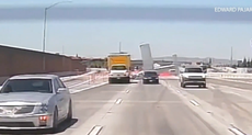 Dramatic video shows small plane crashing onto California freeway and bursting into flames