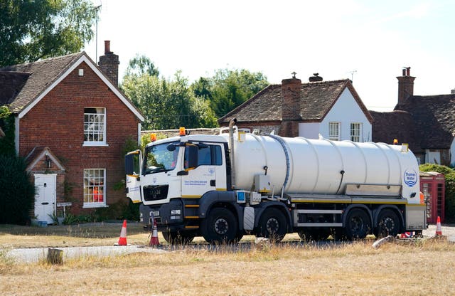 A tanker from Thames Water delivers a temporary water supply to the village of Northend in Oxfordshire, where the water company is pumping water into the supply network following a technical issue at Stokenchurch Reservoir