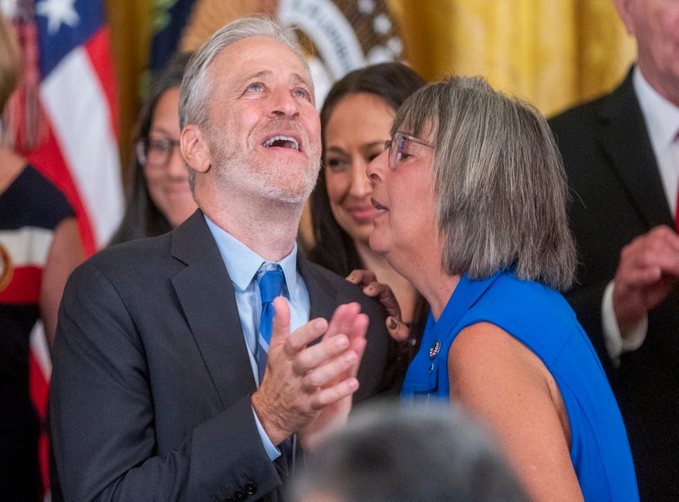 <p>Jon Stewart smiles as the PACT Act is finally signed into law </bl>