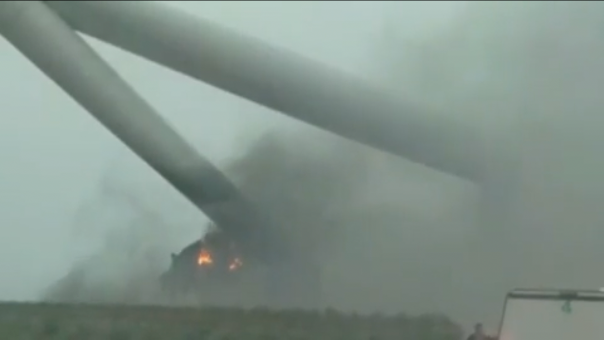 Video captures wind turbine bending and catching fire after severe storm