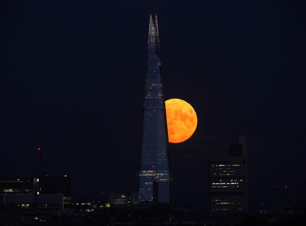 The Shard in London in front of the supermoon (Yui Mok/PA)