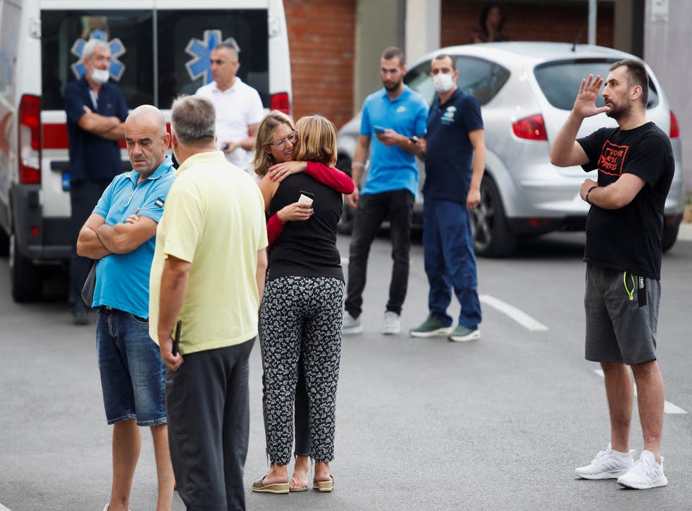 <p>Relatives of victims wait in front of a city hospital after the shooting</bl>