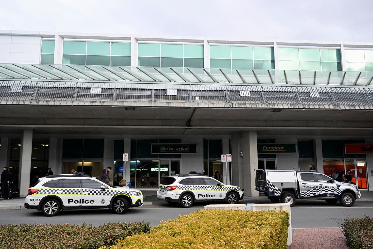 Australian charged with shooting at windows inside airport