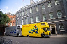 Boris Johnson only doing ‘urgent’ work on second holiday as removal vans arrive at No 10
