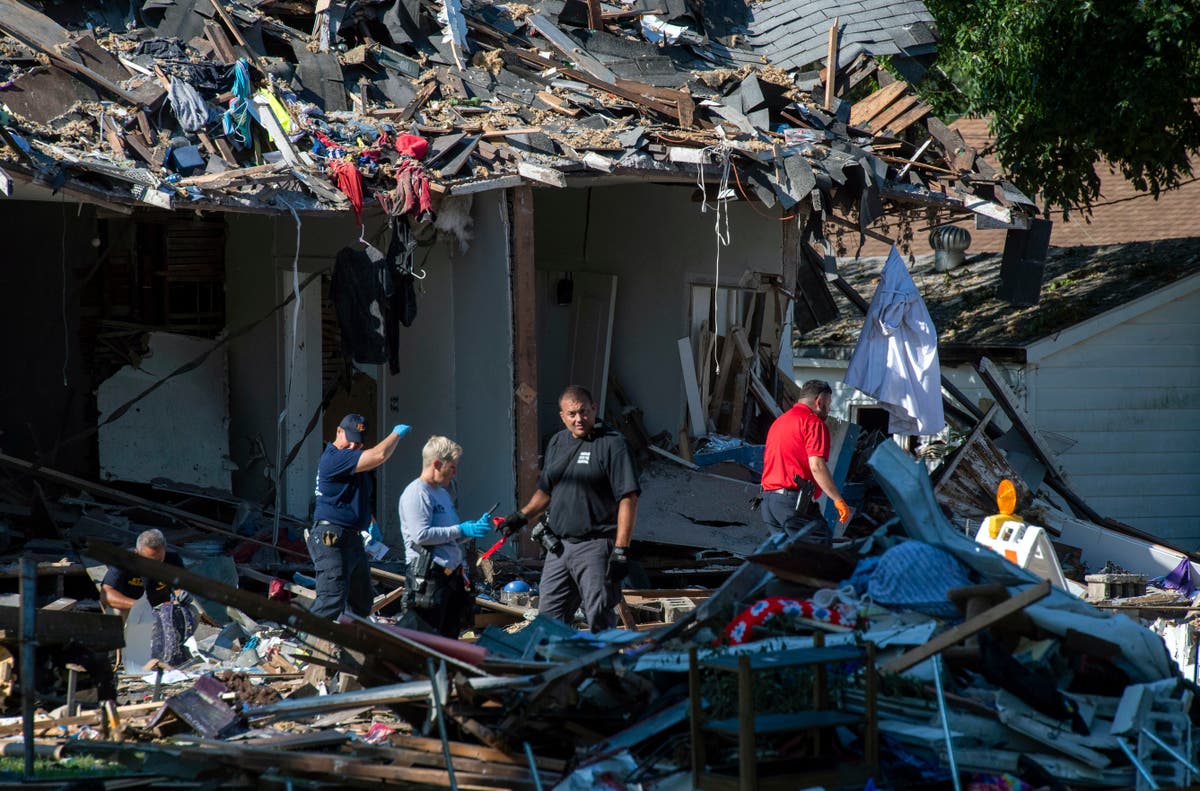 Evansville house explosion victims died of trauma asphyxia