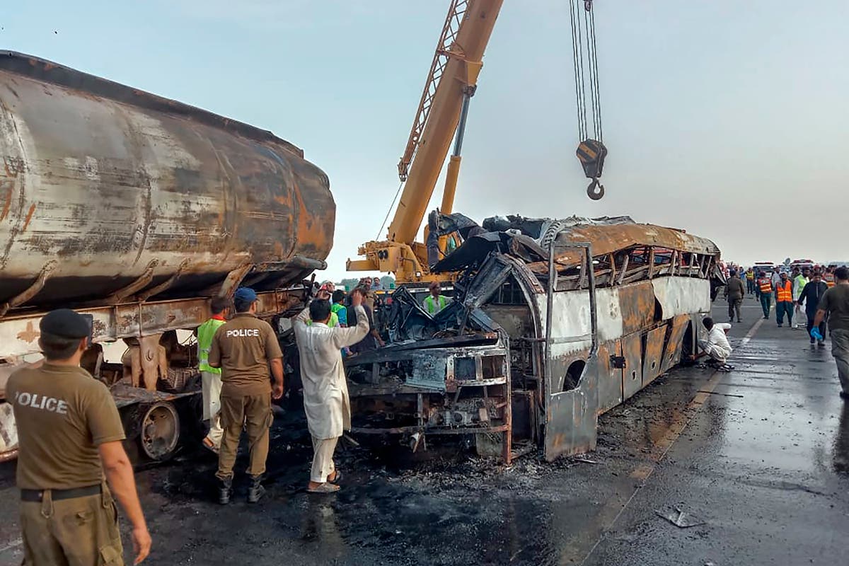 Bus rams into fuel trick in eastern Pakistan, killing 20