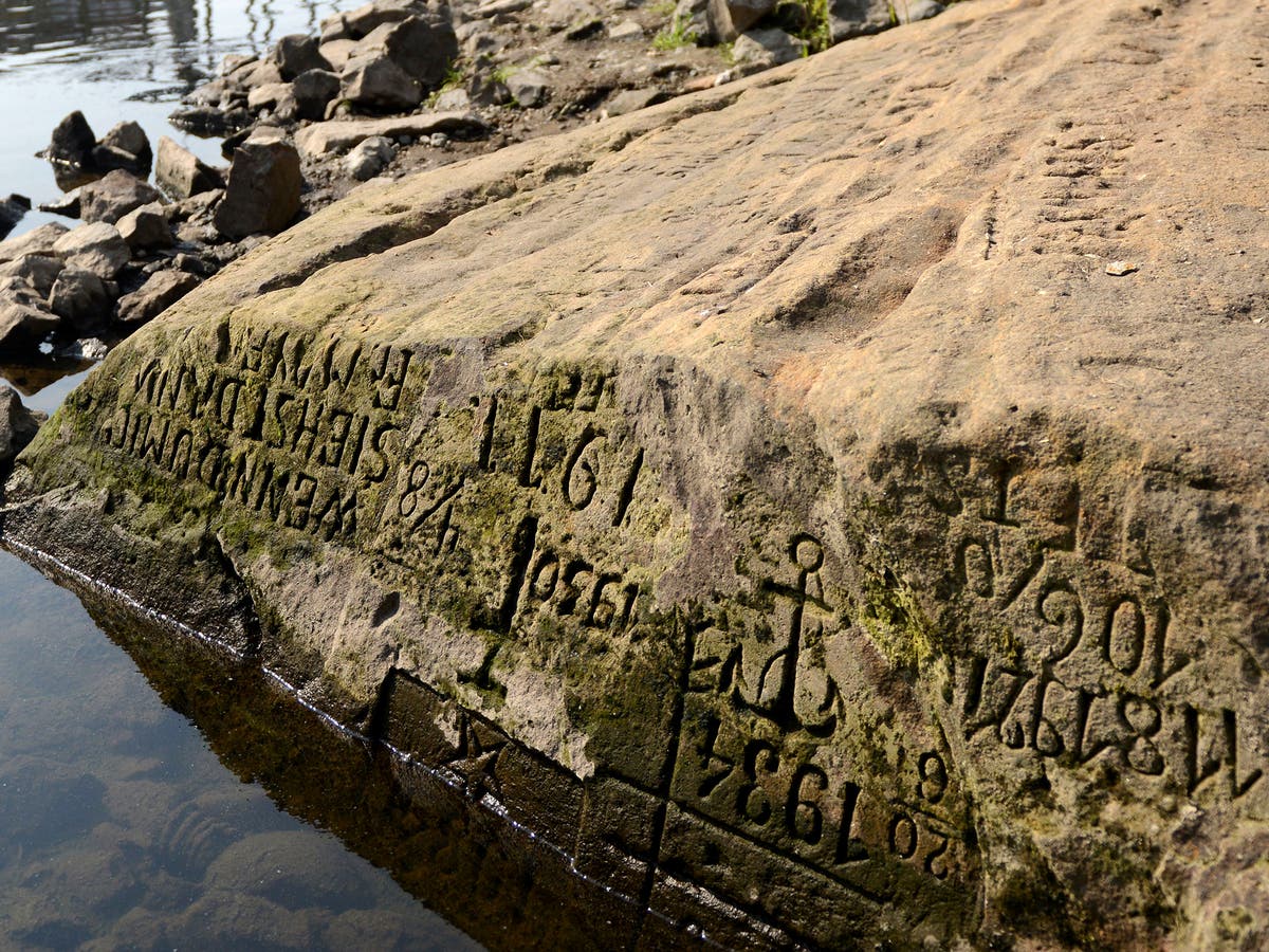 Drought reveals ‘hunger stones’ in German river historically used to forecast famine