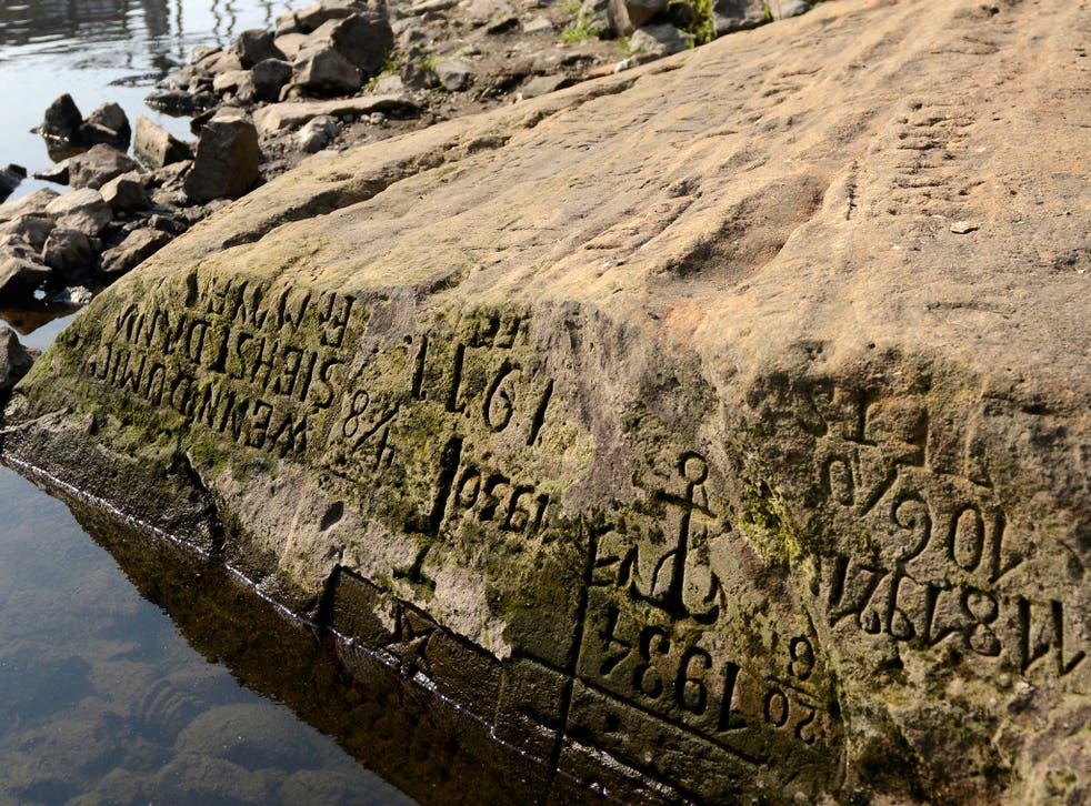 <p>Hunger stone on the Elbe in Decin, Czech Republic</p>