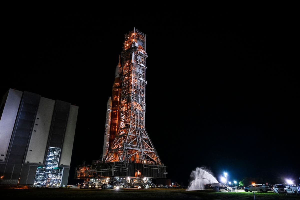 Nasa’s new Artemis Moon rocket rolls to its launchpad